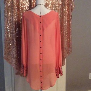 Ladies semi-sheer top with brass detail